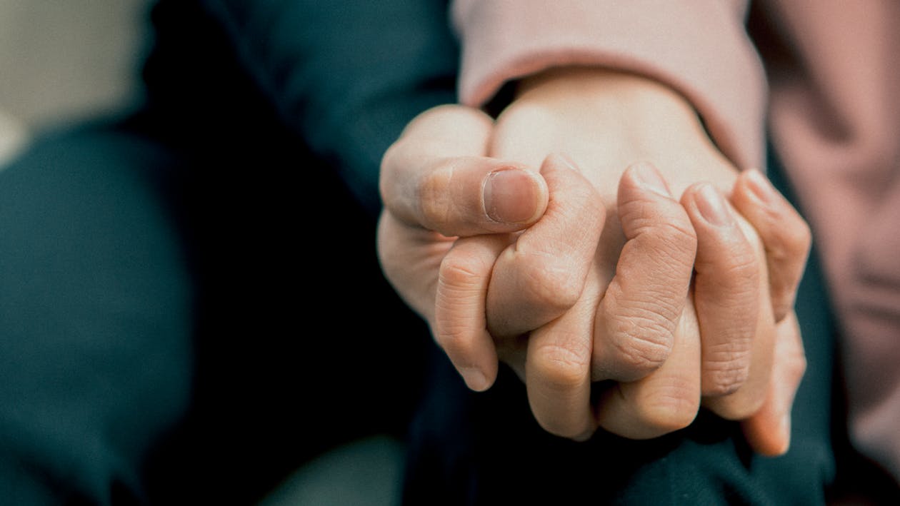 Free Photo of Holding Hands Stock Photo